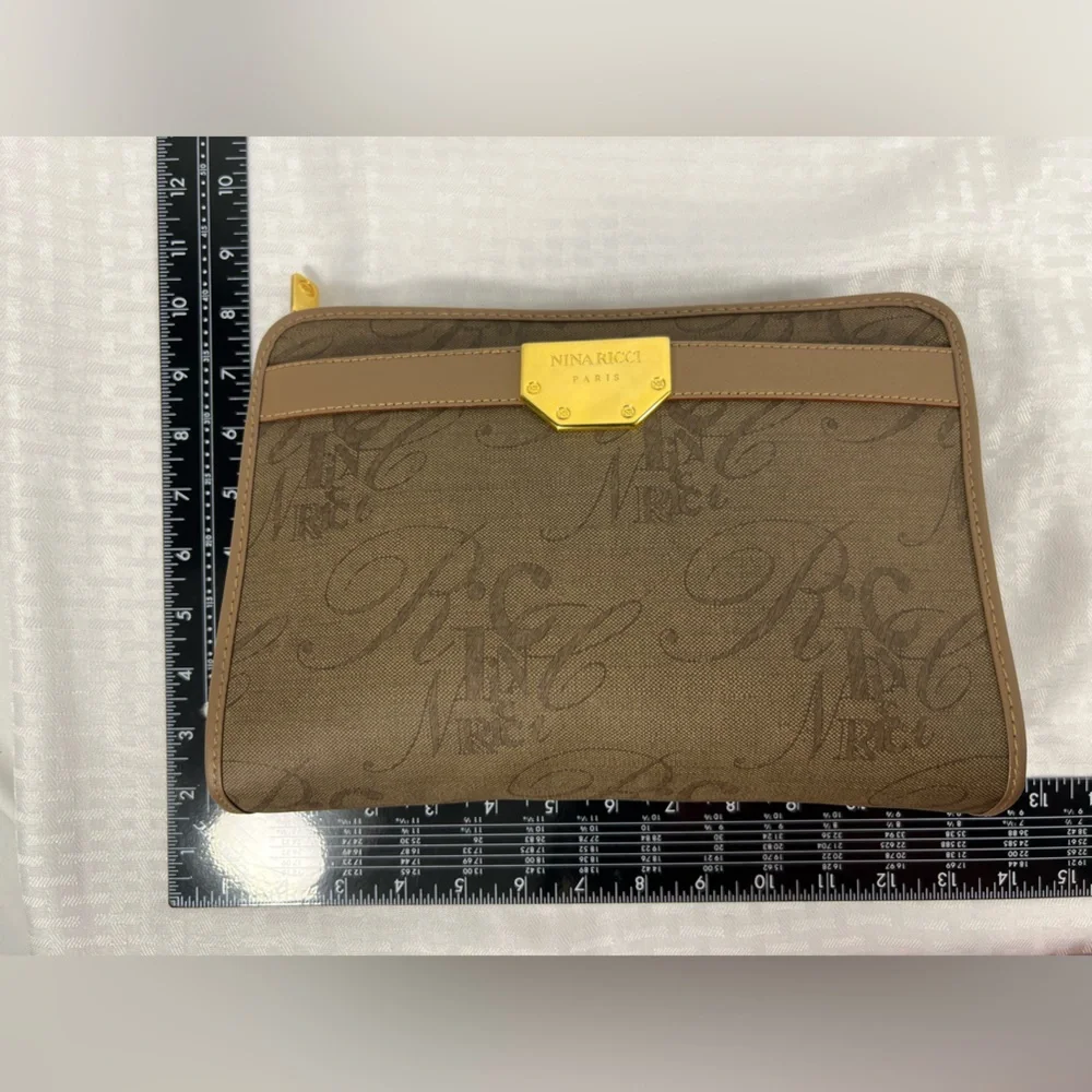 7058: Vintage Nina Ricci Paris Monogram Zip Clutch Pouch Made in Italy